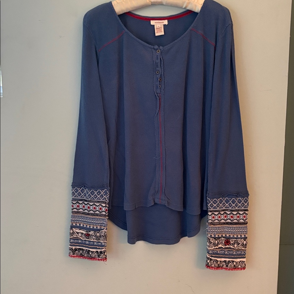 Blue Long Sleeve Top with embellished sleeves.